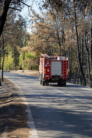 Rhodes, greece, circa August 2021 - Firefighters controlling forest after fires