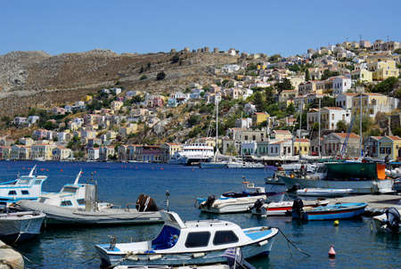 symi, greece, circa August 2021 - small village at harbor