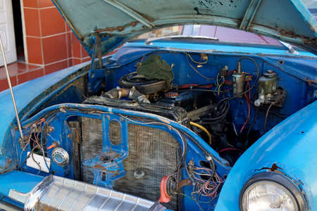 old classic cars in the streets of trinidad on cuba