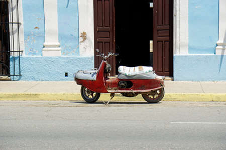 old moped in the streets of havanaの写真素材