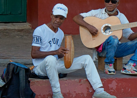 Trinidad, Cuba, circa May 2022: local band playing salsa and merengue music in the streetsのeditorial素材