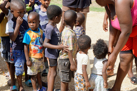 La Romana, Dominican Republic, circa September 2022 - poor children in a run down farm worker villageのeditorial素材