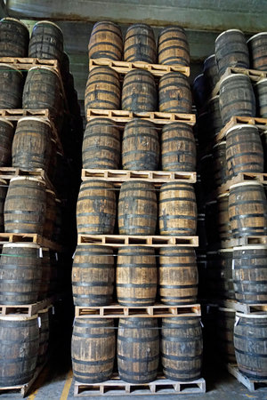 La Romana, Dominican Republic, circa September 2022 - Old oak wook rum barrels in a local rum...