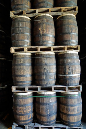 La Romana, Dominican Republic, circa September 2022 - Old oak wook rum barrels in a local rum factoryのeditorial素材