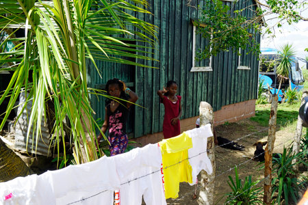 La Romana, Dominican Republic, circa September 2022 - poor children in a run down farm worker villageのeditorial素材