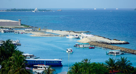 Tropical boats docked at marina on Maafushi Island on the Maldivesの写真素材