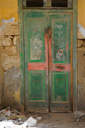 Old, weathered wooden door in El Quseir in Egyptの写真素材