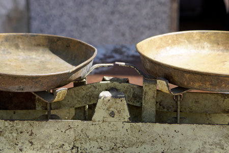 Close up of old run down two pan balance scaleの写真素材