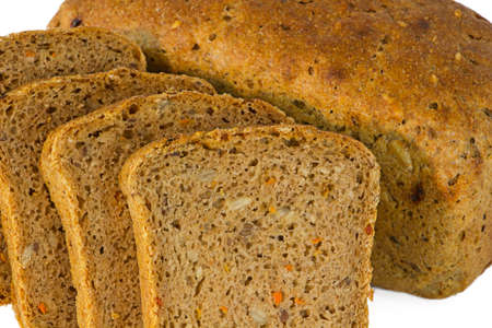 Loaf of bread with sliced piaces - isolated  with white 