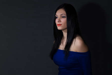 Smiling girl in blue dress - photo portraitの写真素材