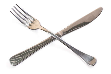 Fork and knife  isolated on white の写真素材