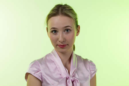 Portrait of woman - photo portrait with green backgroundの写真素材