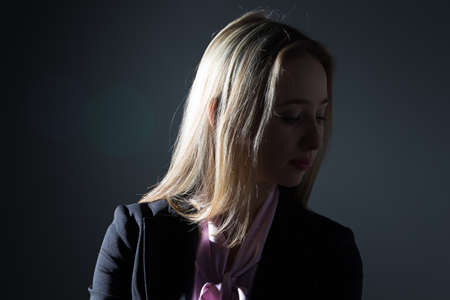Portrait of businesswoman - photo portrait with gray backgroundの写真素材