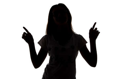 Silhouette of teenager girl with white background - isolated photoの写真素材