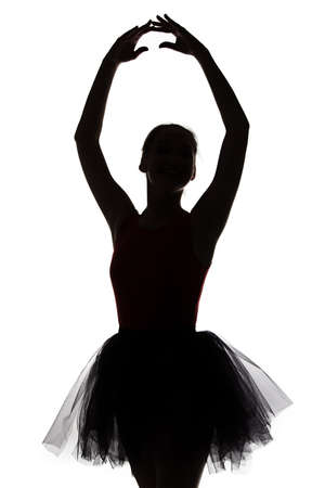 Shape of ballerina with hands up on white backgroundの写真素材