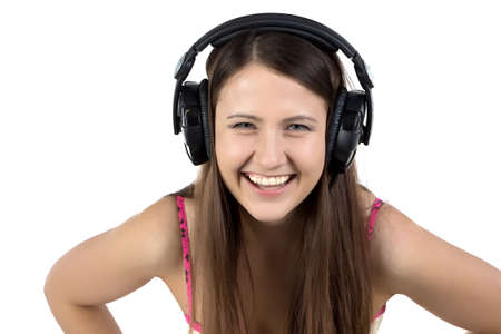 Portrait of fun woman in headphones on white background