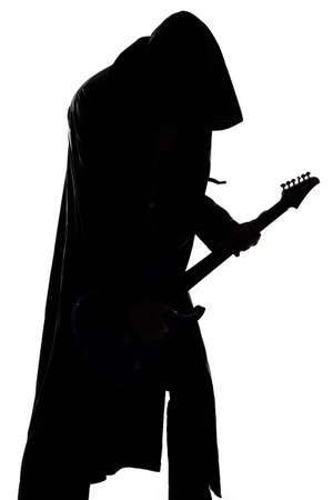 Image of young man silhouette playing the guitar on white の写真素材