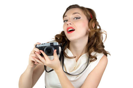 Image of the woman with retro camera on white backgroundの写真素材