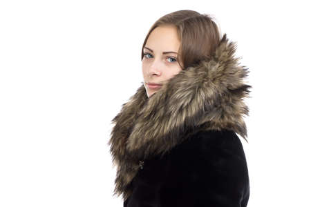 Image of the cute woman in winter coat on white backgroundの写真素材