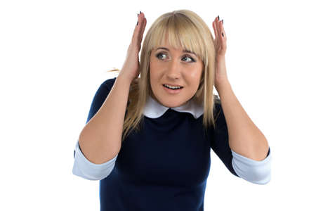 Portrait of business woman covered her ears on white backgroundの写真素材