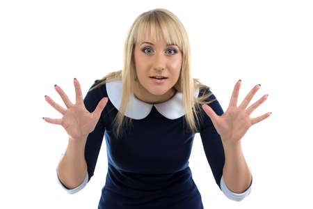 Photo of surprised business woman with open hands on white backgroundの写真素材