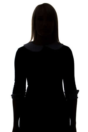 Silhouette of woman in dress on white backgroundの写真素材