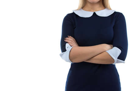 Photo of woman with arms crossed on white background