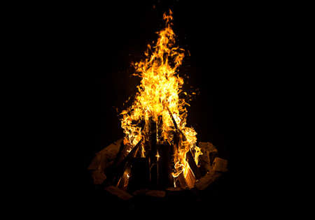 Photo of bonfire by night on black backgroundの写真素材