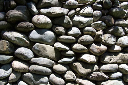 Photo gray stones in the sun, summerの写真素材