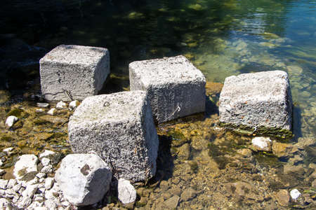 Photo of square stones among water in the summerの写真素材