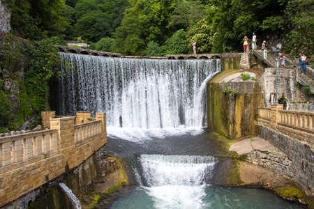 Photo of old artificial waterfall among trees, Abkhaziaのeditorial素材