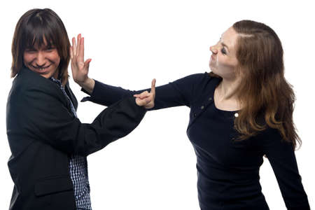 Woman hits a man on white backgroundの写真素材