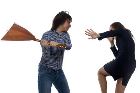 Angry man with balalaika and woman on white backgroundの写真素材