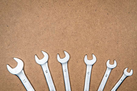 Different wrenches on the bottom. Construction background with tools.の写真素材