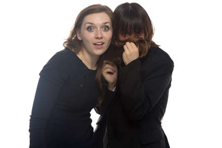 Woman and sick man putting her hair in nose. Isolated photo with white background.の写真素材