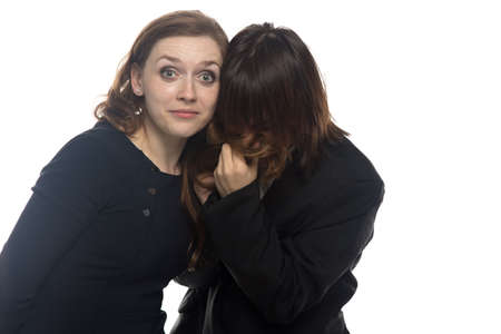 Surprised woman and sick man in black jacket. Isolated photo with white background.の写真素材