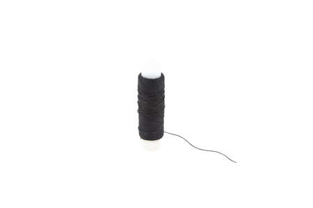 Black thread on white background. Isolated photo of an object with white background.の写真素材