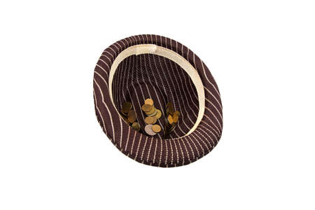 Brown hat with money on white background. Isolated photo of an object with white background.の写真素材