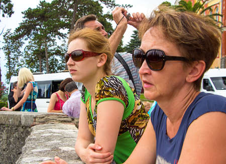 Tourists are tired and waiting. Travel photo in the summer.のeditorial素材