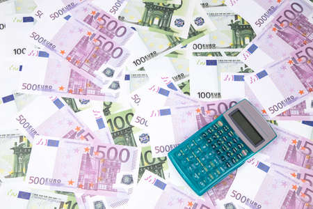 Background of hundreds euro and calculator. Photo of background.の写真素材