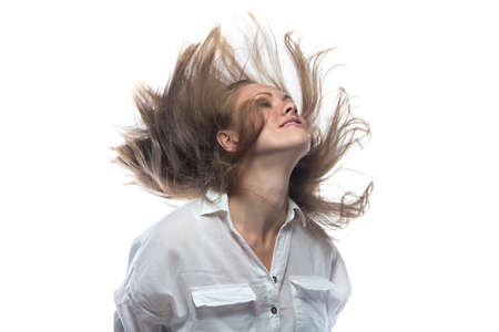 Shaking head young woman in casual shirt on white background