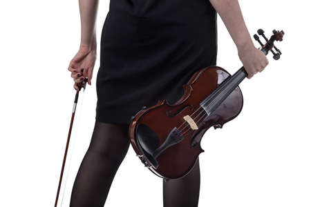 Woman with violin from back on white backgroundの写真素材