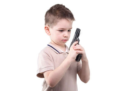 Little boy with the gun on white backgroundの写真素材