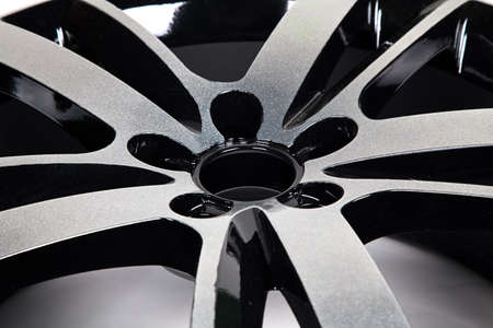 Powder coating of black wheel disk, close up