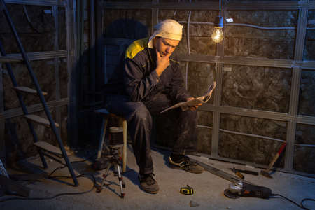 Puzzled foreman during overhaul at the construction siteの写真素材
