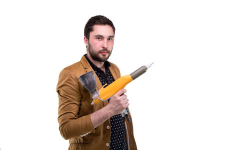 Young bearded man with powder spray on white backgroundの写真素材