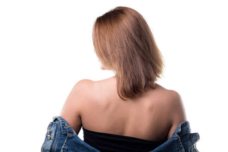 Blond woman with naked shoulders on white backgroundの写真素材