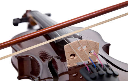 Wooden brown fiddle with bow on white backgroundの写真素材