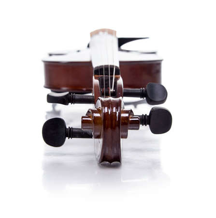 Parth of wooden brown violin, isolated on white backgroundの写真素材
