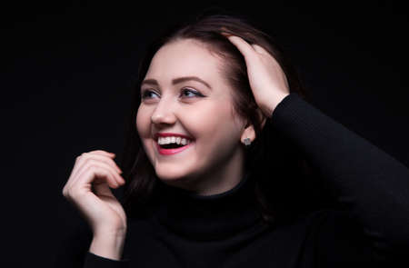 Portrait of laughing brunette womanの写真素材